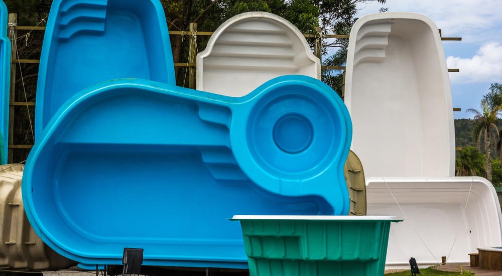 Various shapes of fiberglass pools