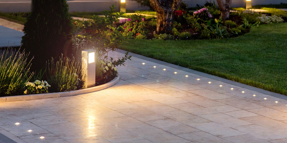 outdoor area with upright lights and in-tile lights