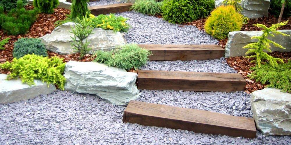 garden steps using wooden sleepers and small stone paving