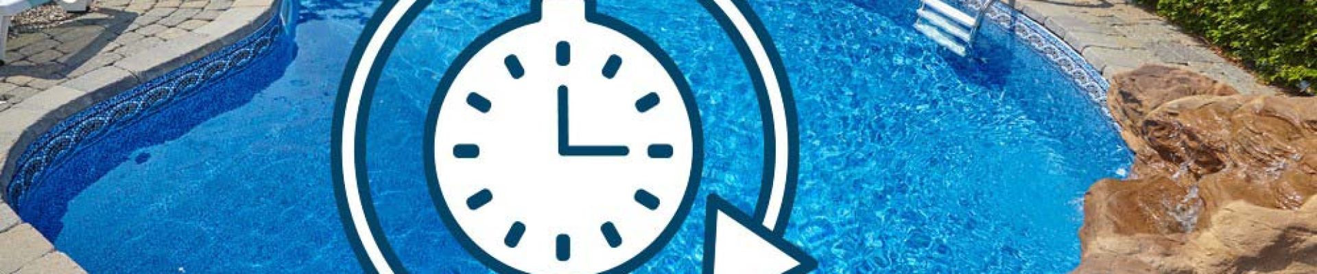 A swimming pool with an icon of a stopwatch encircled by an arrow superimposed on it.