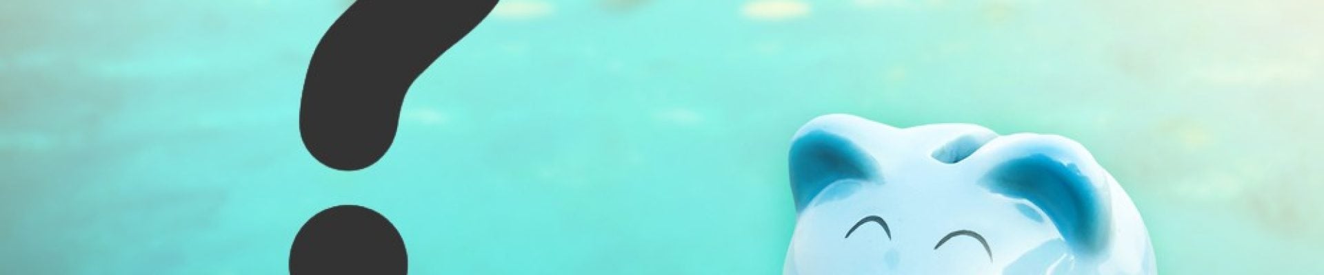 A blue piggy bank sits on a wooden surface with a large black question mark next to it, against a blurred aqua-colored background.