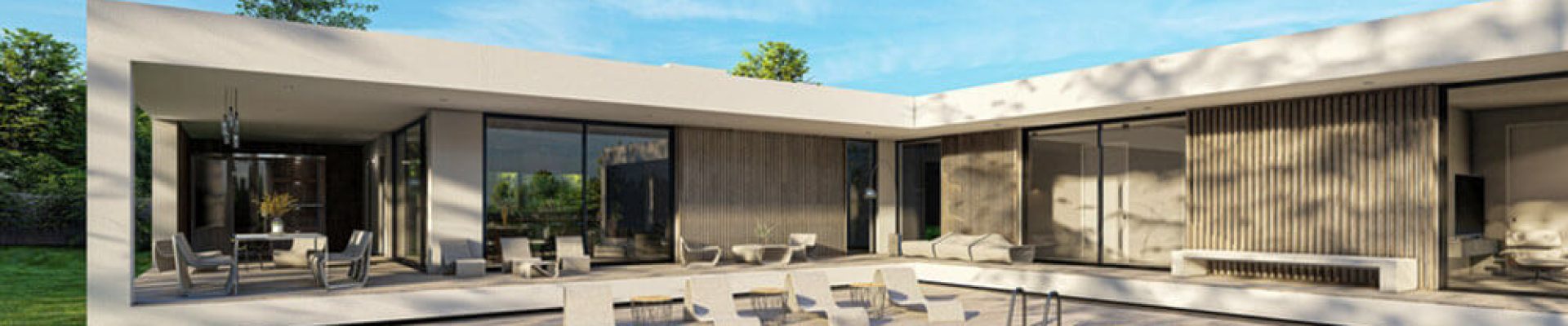 Modern, single-story house with large glass windows, an outdoor seating area, and a small rectangular pool on a wooden deck, surrounded by greenery.